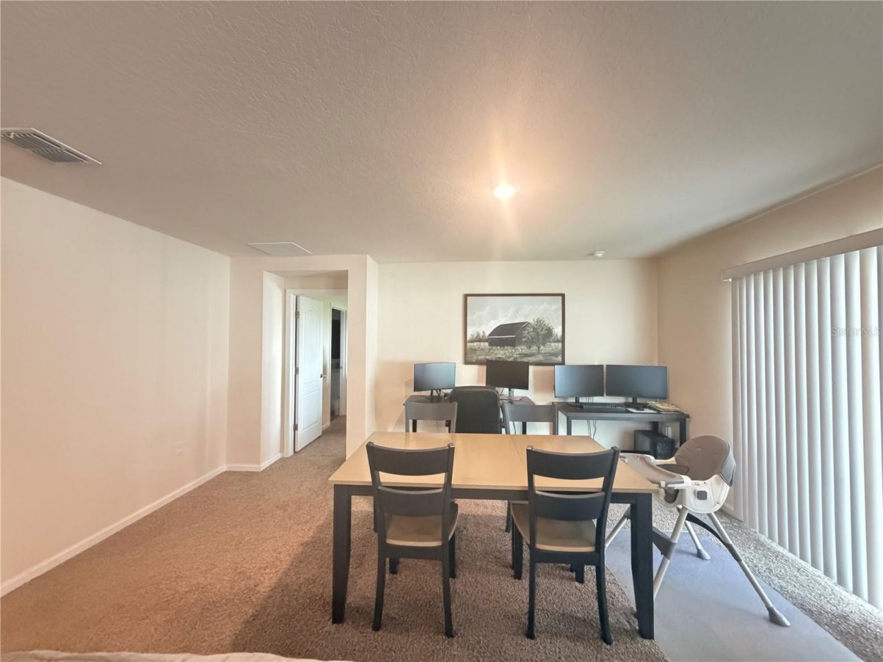 Photo 15 of 20: Dining Room with Patio Door to Back Yard