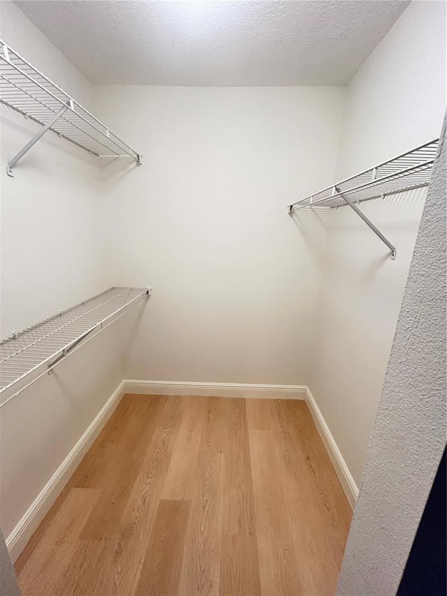 Photo 20 of 20: PRIMARY BEDROOM WALK IN CLOSET