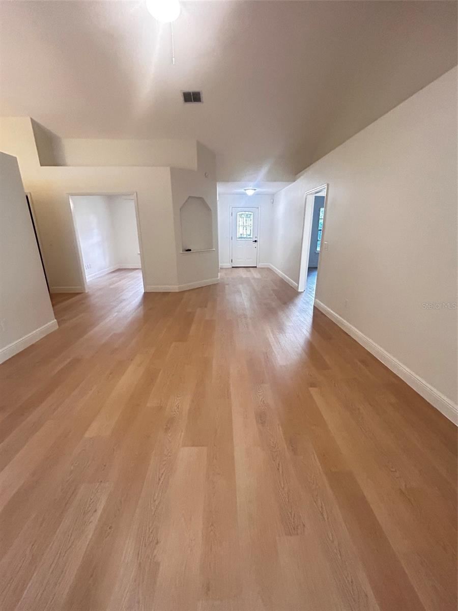 Photo 13 of 20: Large Living room with vaulted ceilings.