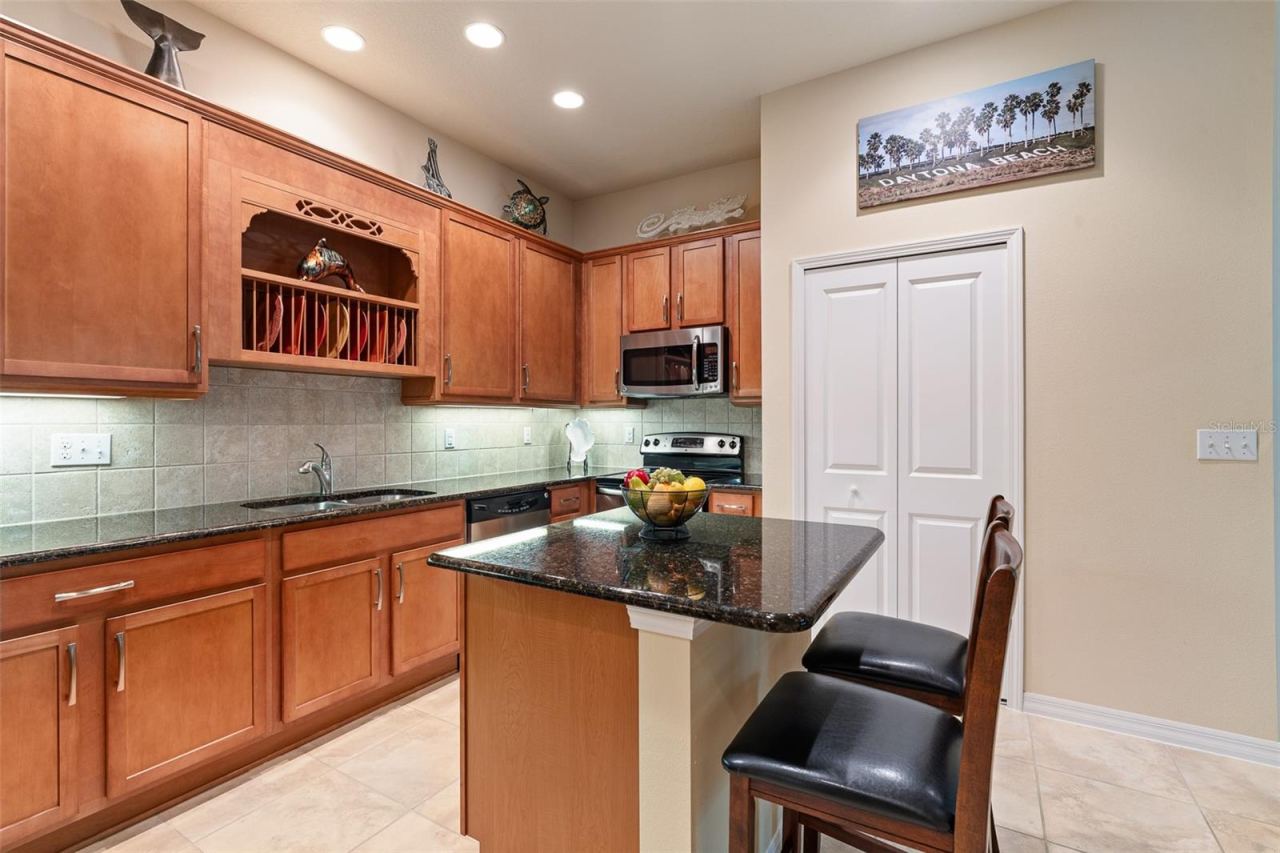 Photo 9 of 20: Granite Countertops w/Tile Backsplash