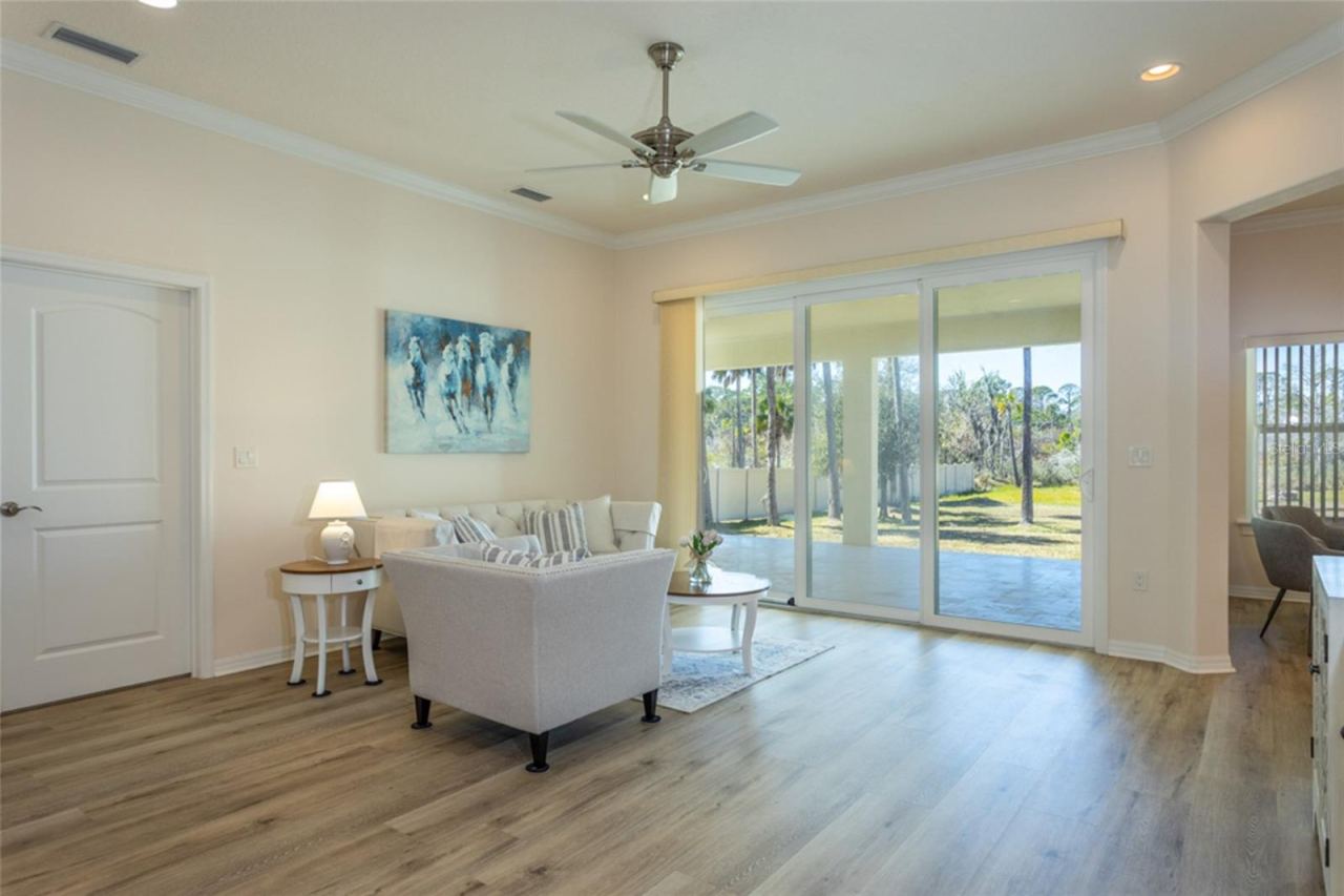Photo 4 of 20: LIVING ROOM W/SLIDERS TO LANAI