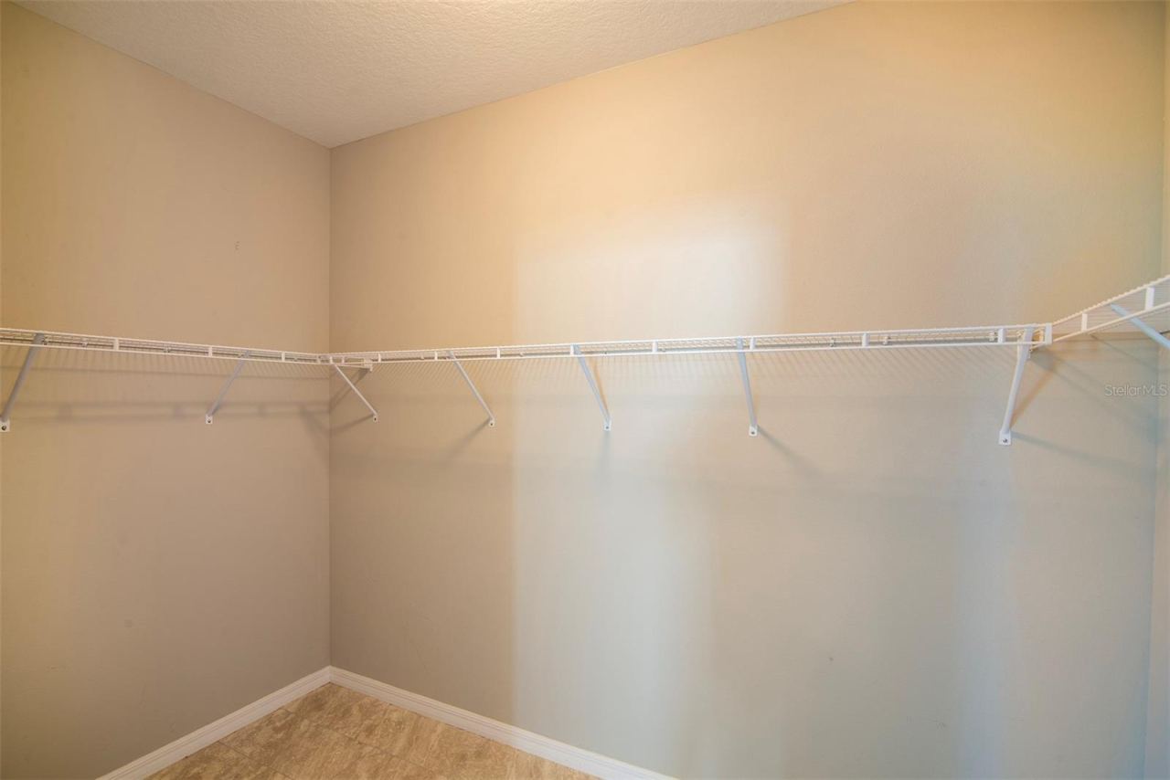 Photo 18 of 20: Primary Walk-In Closet