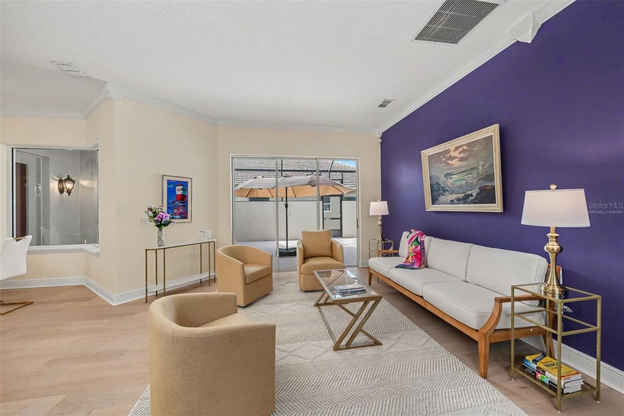 Photo 5 of 20: Family room looking toward the courtyard (not virtually staged)