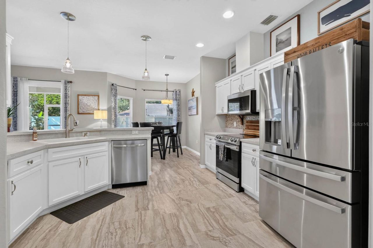 Photo 13 of 20: Open kitchen with new stainless steel appliances