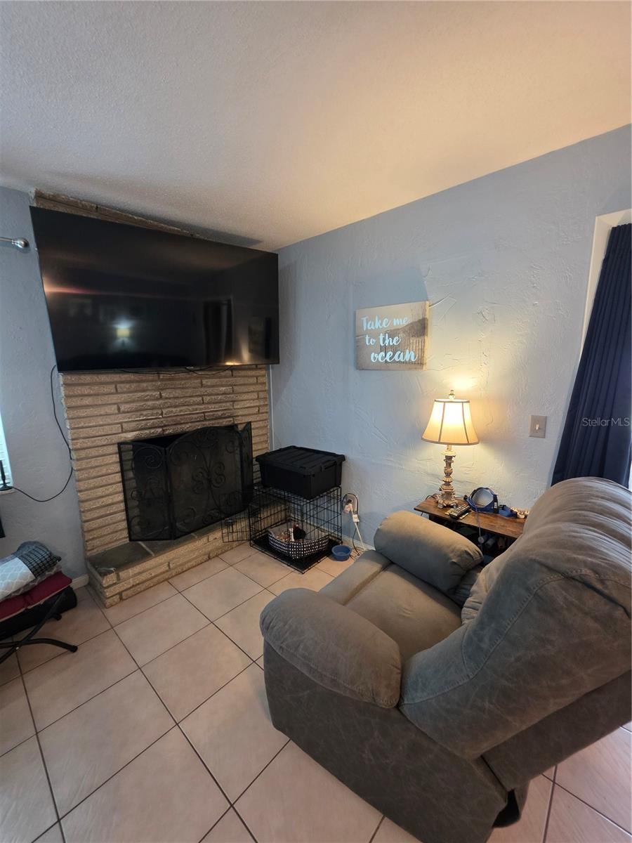 Photo 9 of 20: Wood burning fireplace for those occasional chilly Florida nights!