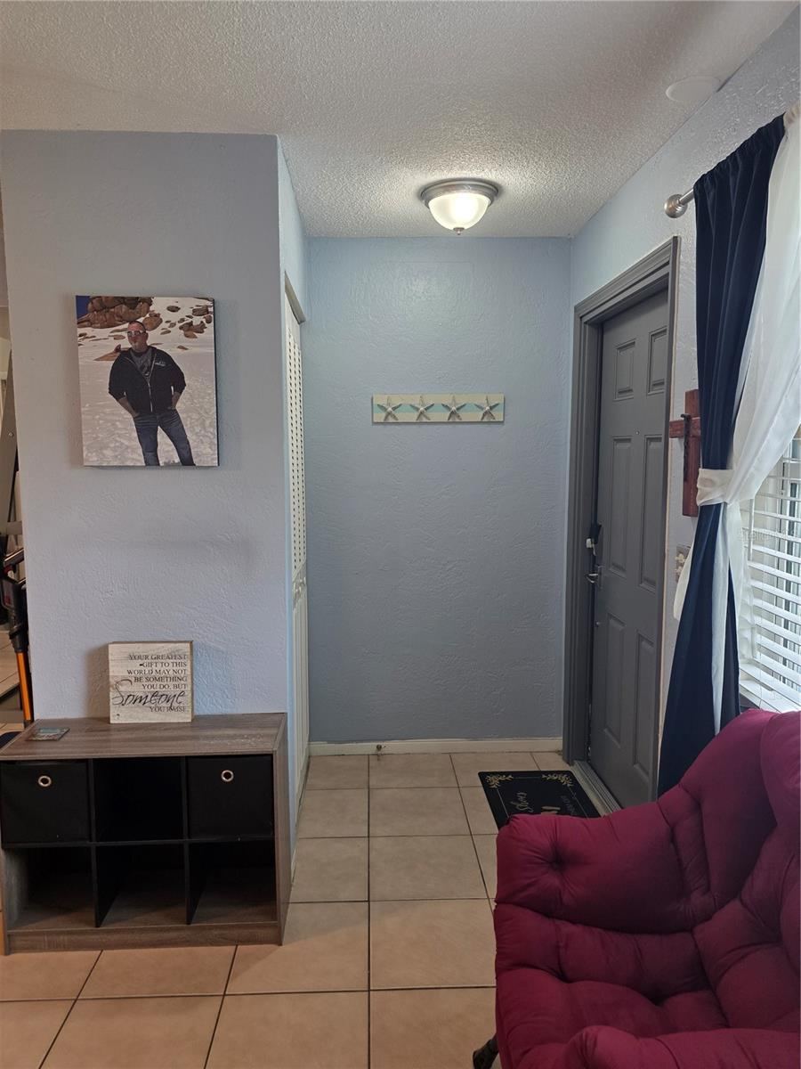 Photo 8 of 20: Foyer with storage closet