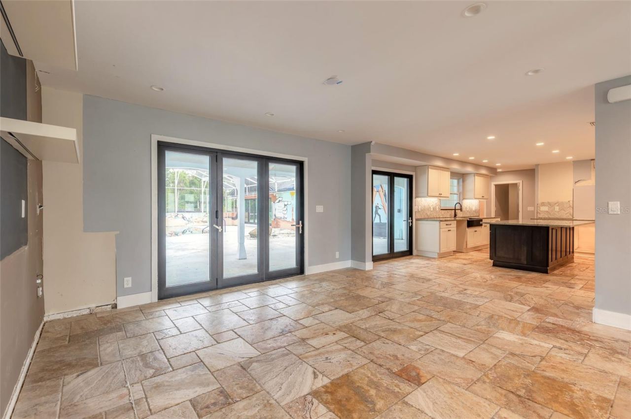 Photo 16 of 20: Family Room to Pool Deck