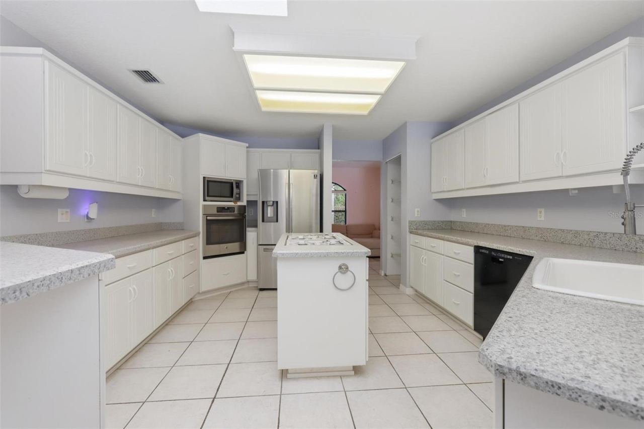 Photo 4 of 20: Kitchen. Island with gas cooktop.