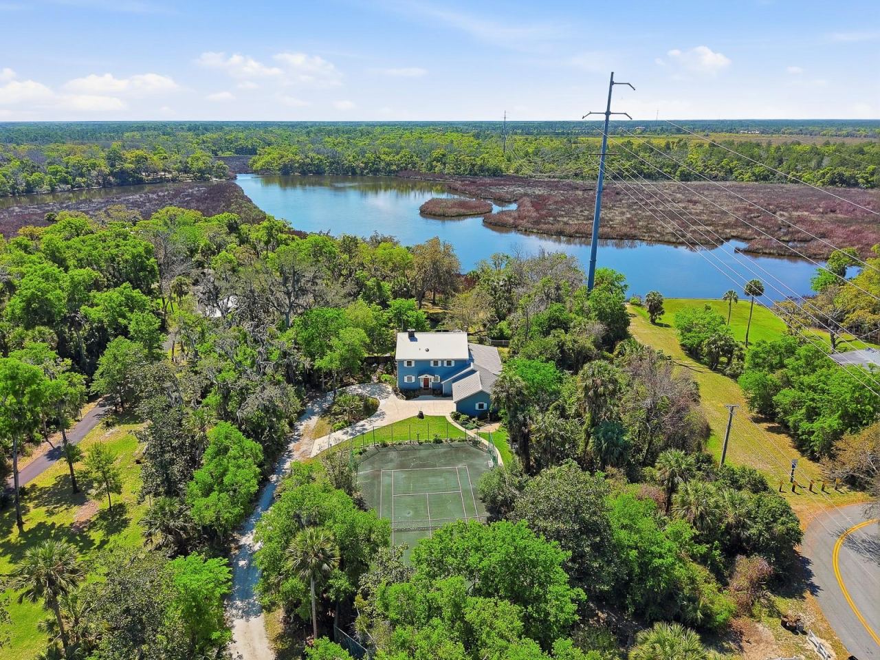 Photo 2 of 20: 112 feet of Spruce Creek frontage!
