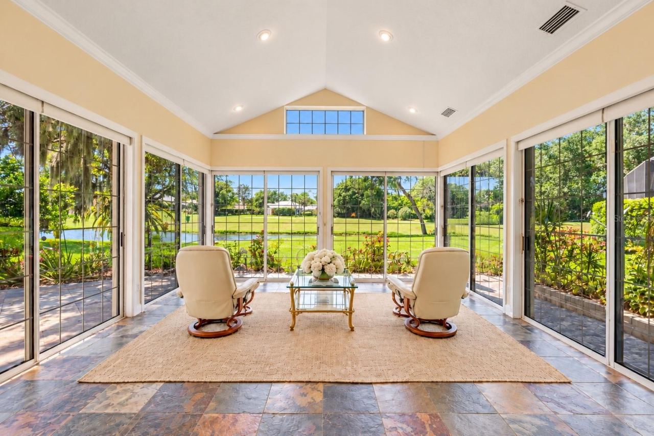 Photo 3 of 20: Florida Rm with view of Lake and Blue#9 course