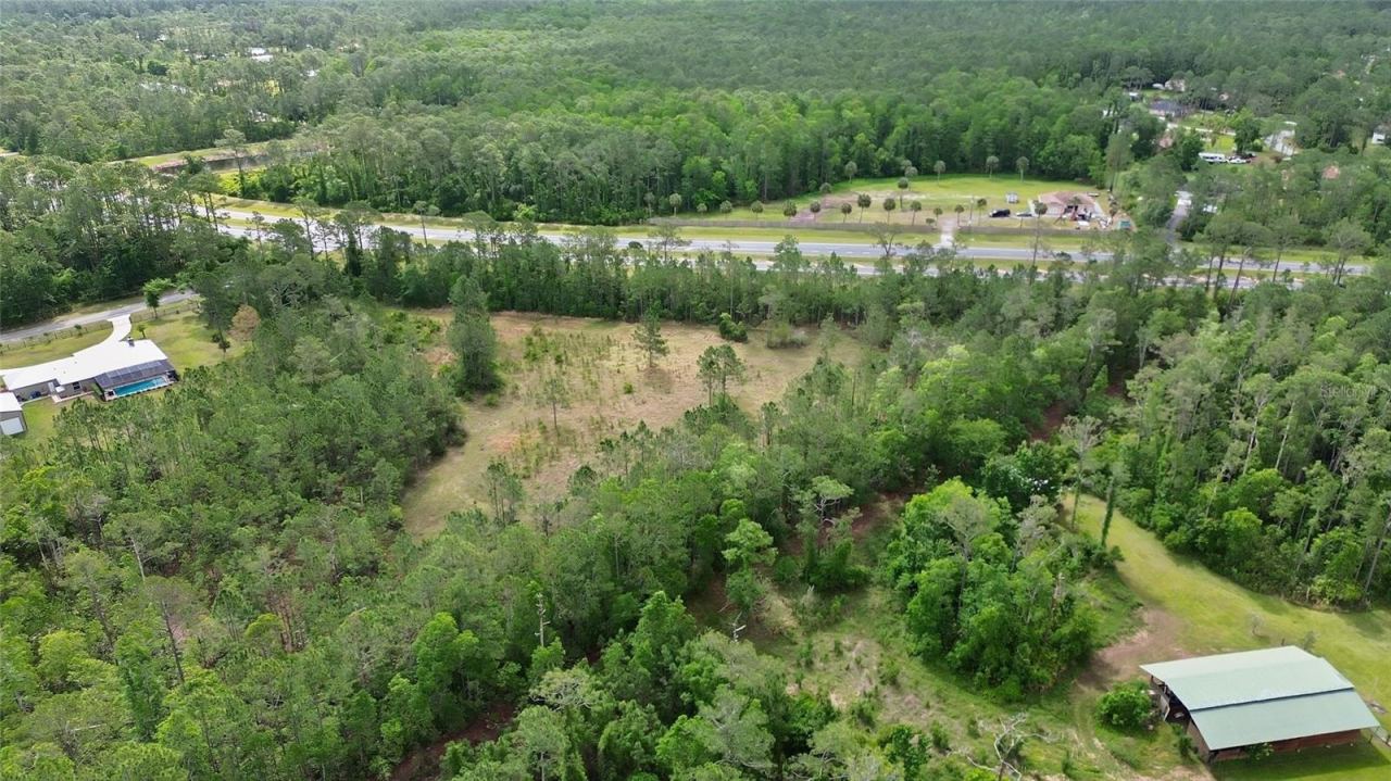 Photo 4 of 13: Drone view of surroundings