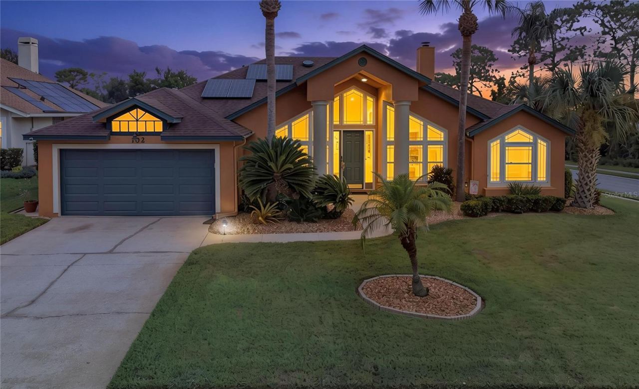 Photo 1 of 20: Immaculately-kept 3/3 DeBary pool home on .27 acre.