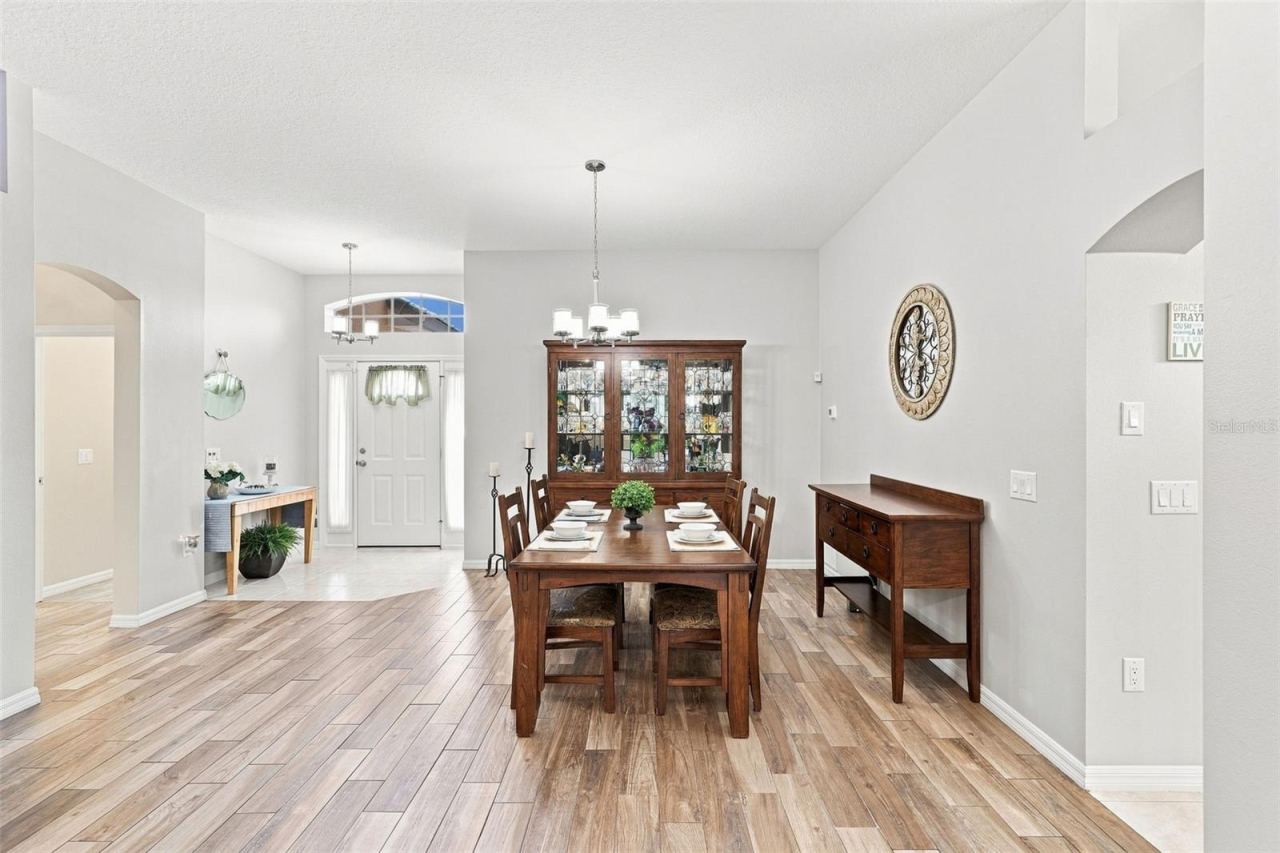 Photo 5 of 20: Foyer & Dining Room. Could also be greeting area or Living Room.