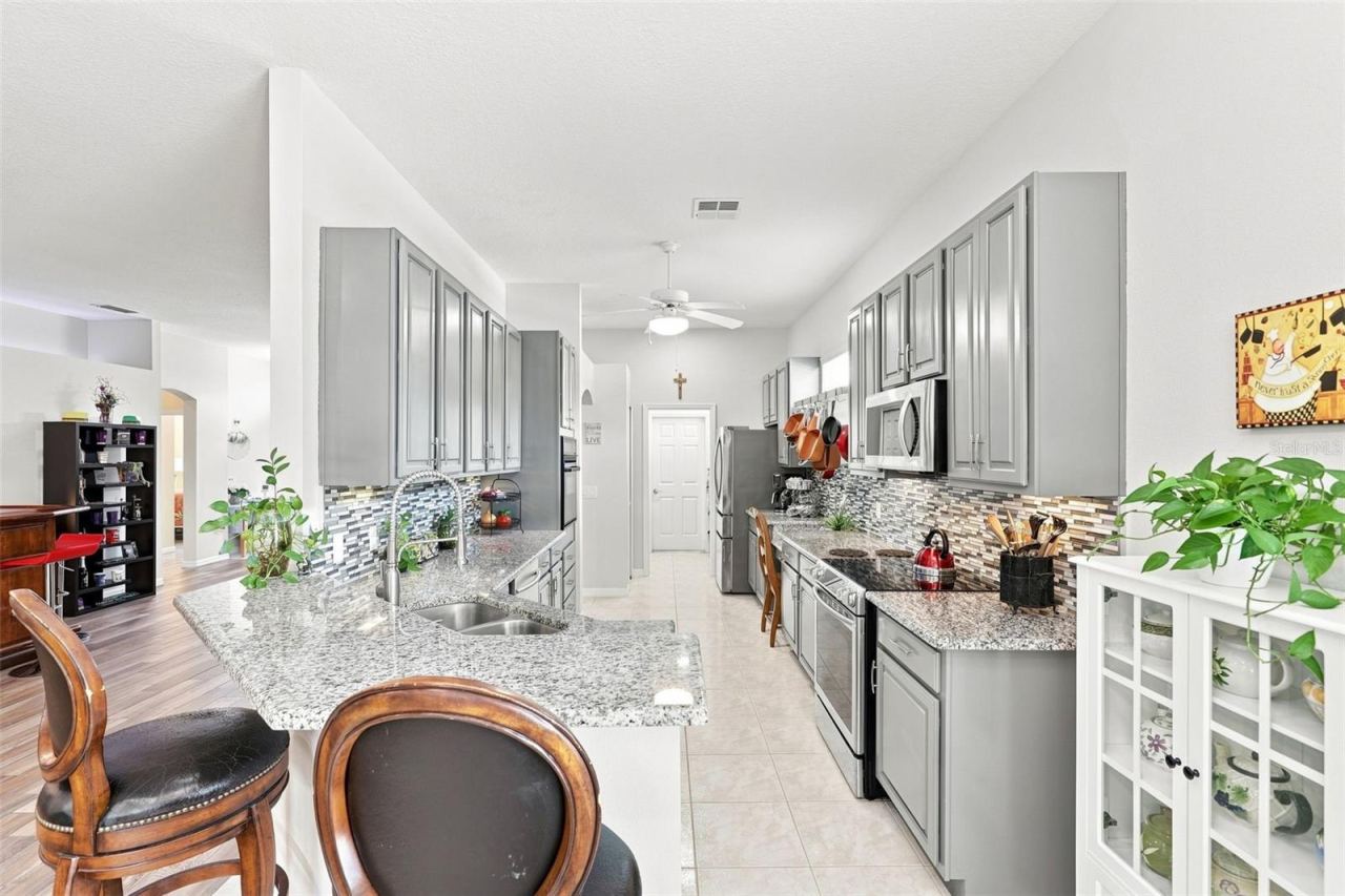 Photo 11 of 20: Beautiful Kitchen with Laundry Room at the other end.