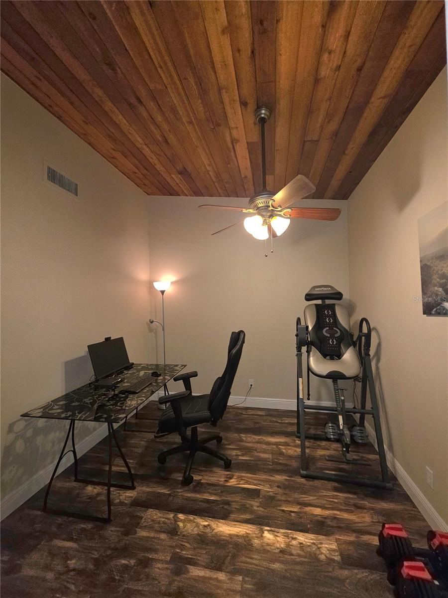 Photo 20 of 20: 3rd bedroom with tall hardwood plank ceilings