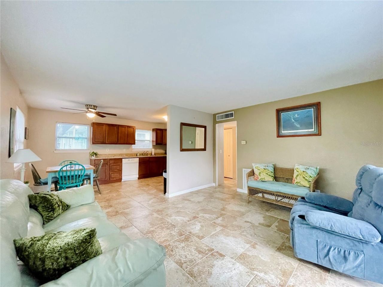 Photo 6 of 20: Spacious living area with an open connection to the kitchen and dining space, creating an easy flow for everyday living and entertaining.