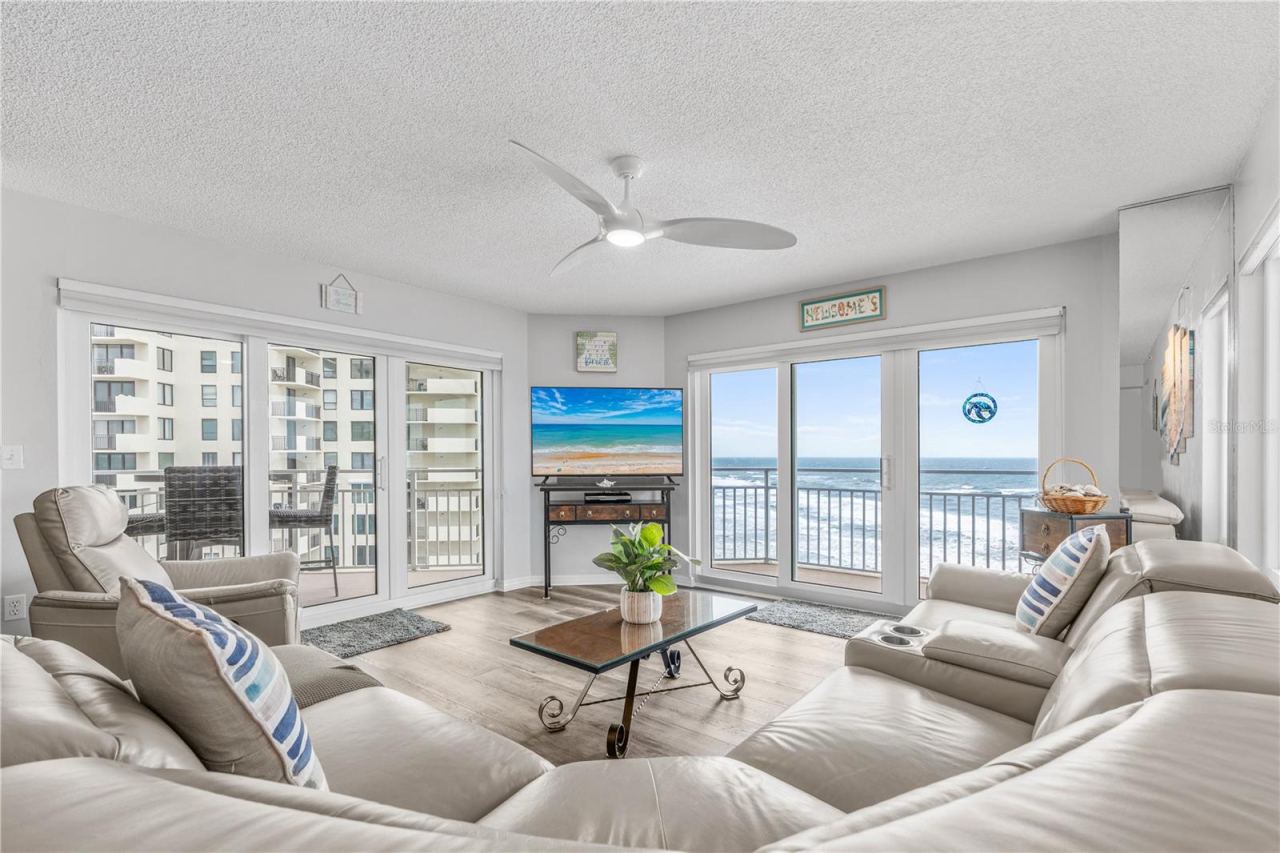 Photo 6 of 20: Living with wrap balconny NE VIEW