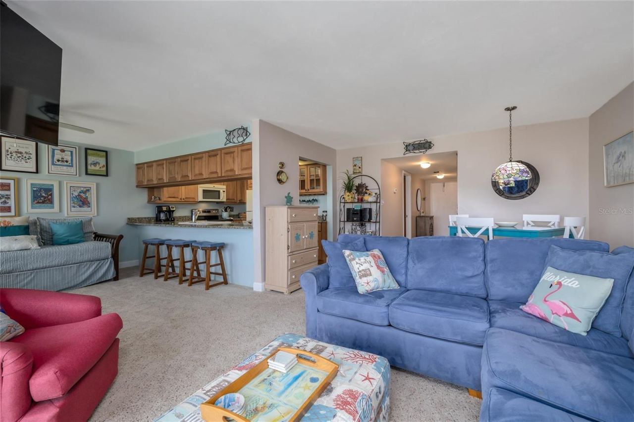 Photo 6 of 20: Living Room to Kitchen & Dining Area