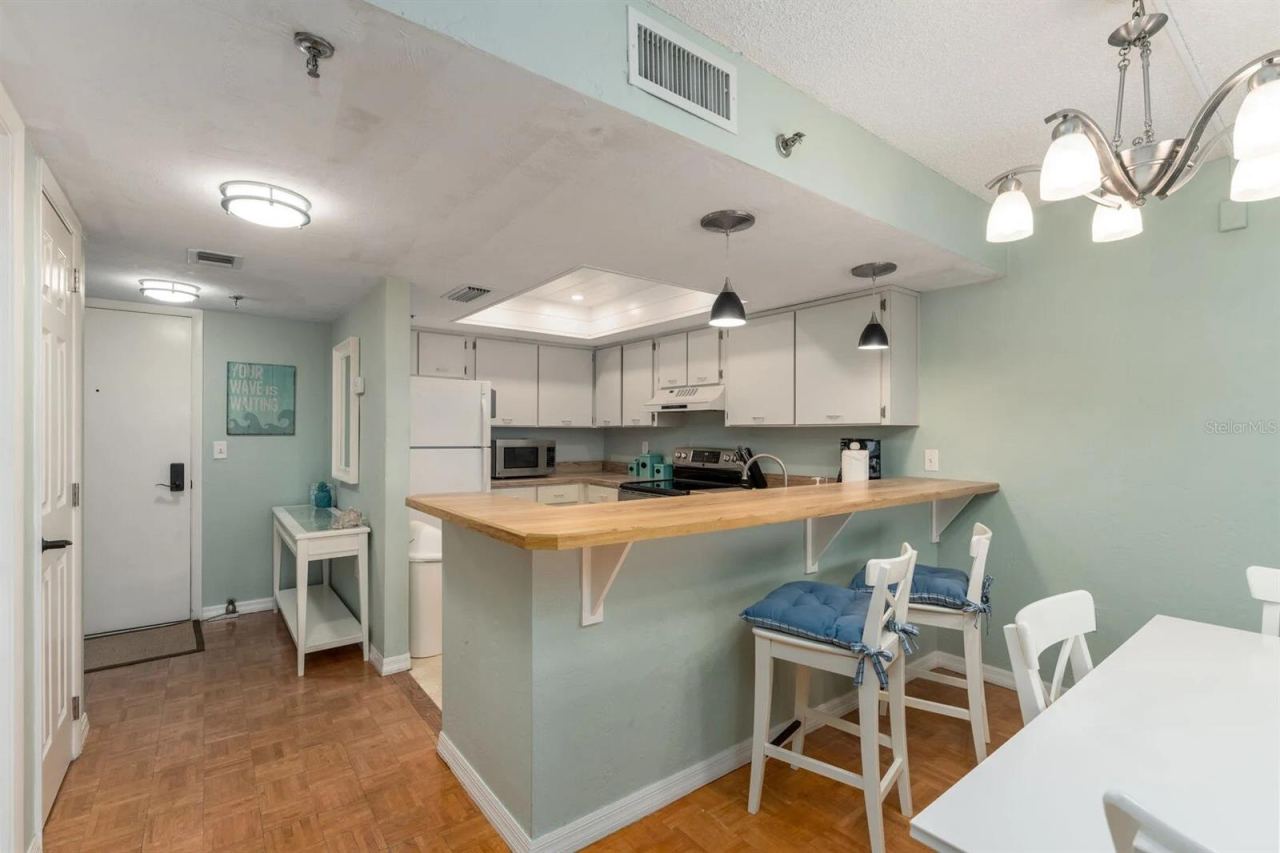 Photo 6 of 20: Kitchen and Front Entry