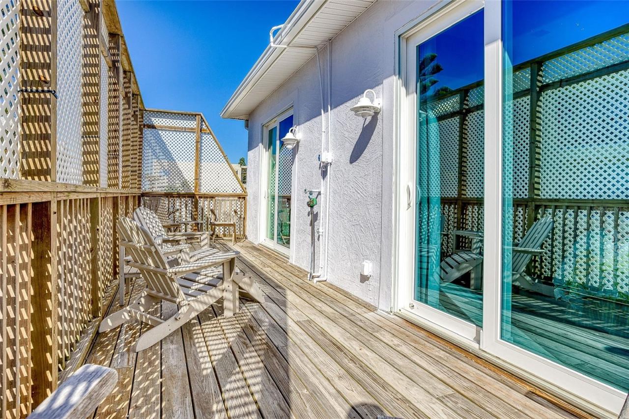 Photo 19 of 20: Private back deck off bedrooms
