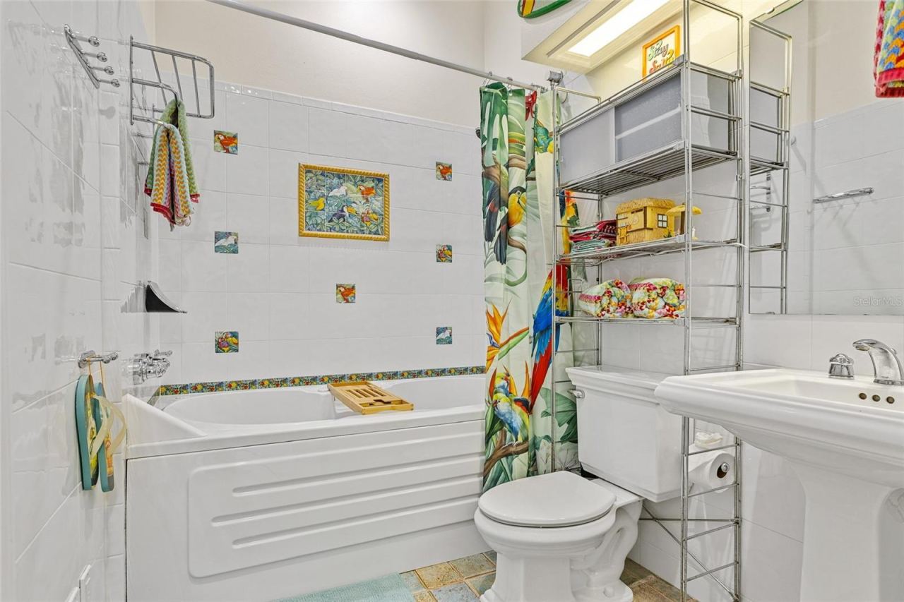 Photo 20 of 20: Guest Bathroom w/ jetted soaking tub and Jack & Jill access for Bedroom 2 and hallway entrance.