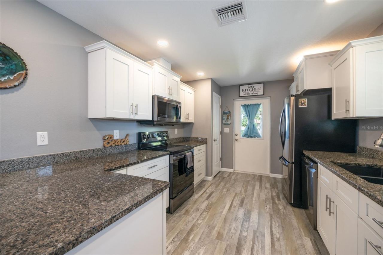 Photo 3 of 20: Spacious kitchen with recessed lighting
