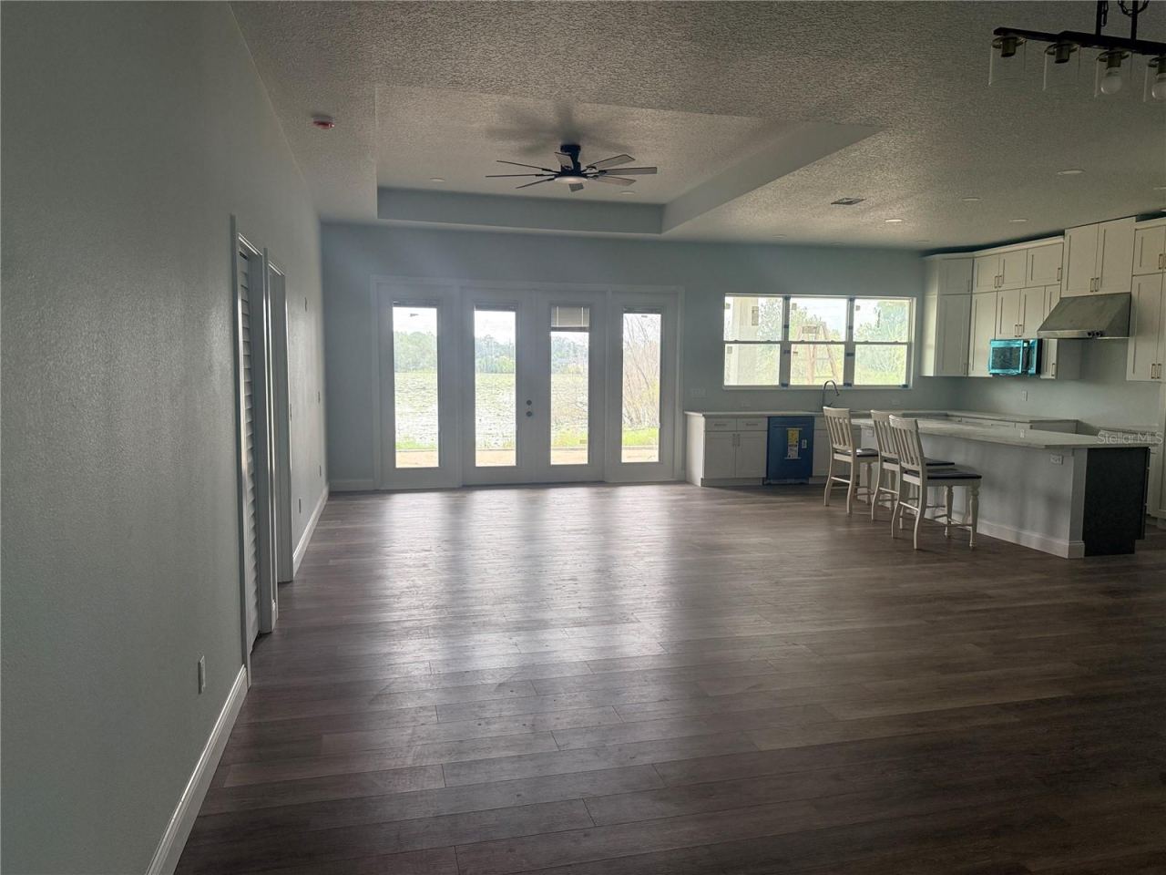 Photo 17 of 20: Comdo great room with family and dining area