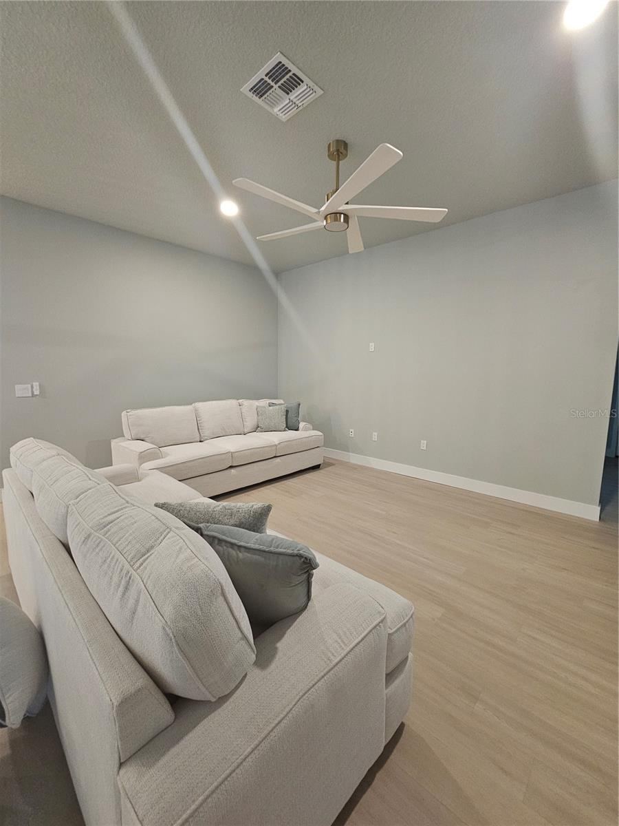 Photo 6 of 20: Great Room - Model Property - Previous Build at Different Location