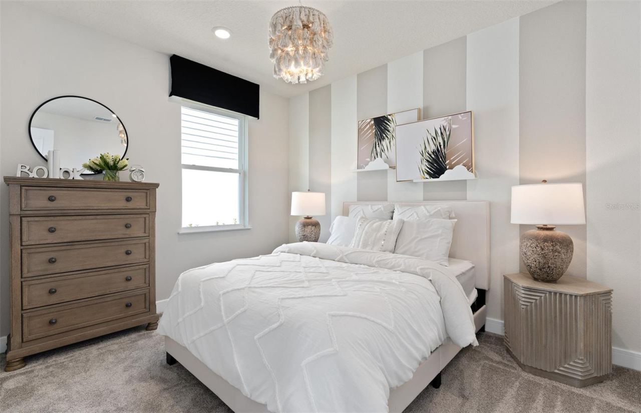 Photo 9 of 16: Model Home Design Only. Pictures and furnishings are for illustrative purposes only. Elevations, colors and options may vary. Furniture is for model home staging only.