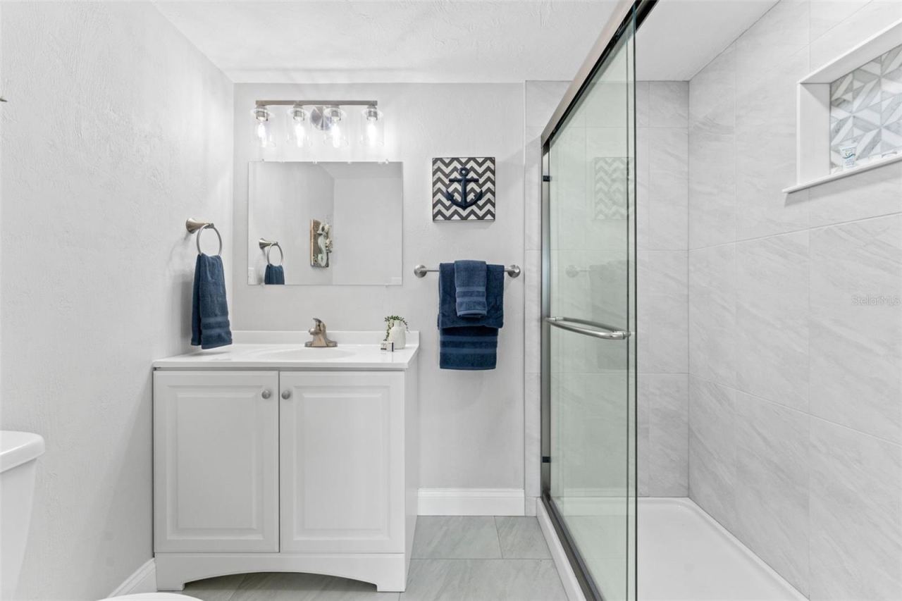 Photo 18 of 20: Bathroom with walk-in shower.