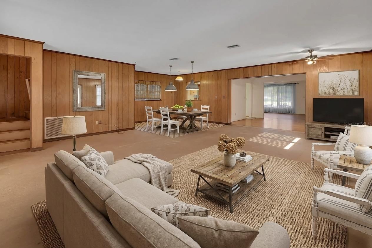 Photo 5 of 20: Family Room and Dining room (steps to Primary bedroom)