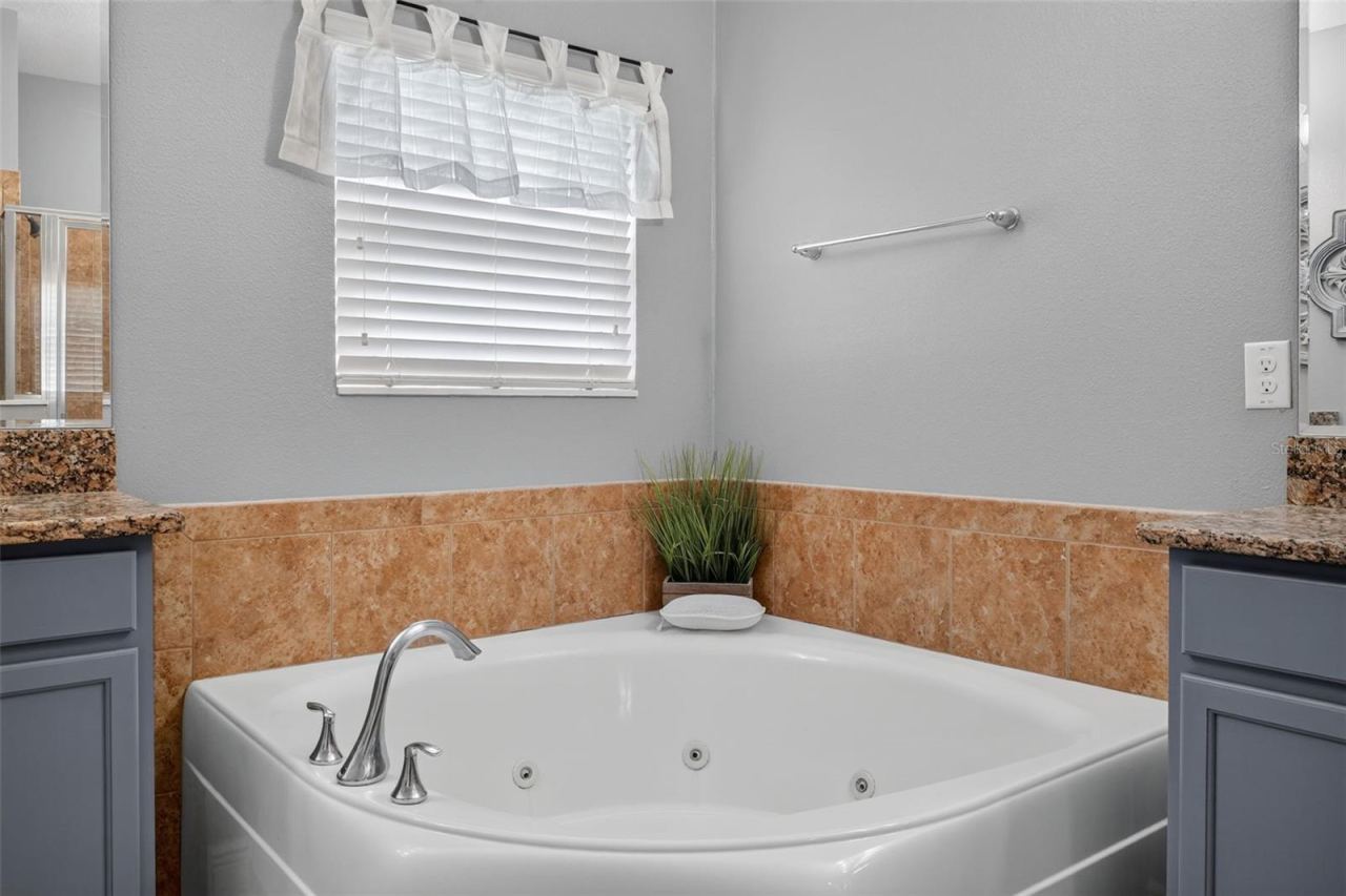 Photo 20 of 20: Custom tile work around jetted garden spa tub