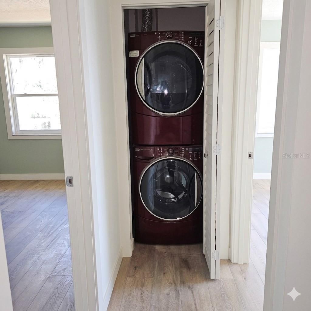 Photo 20 of 20: Washer & Dryer in the hallway closet nicely tucked away or use the laundry room on the 1st floor