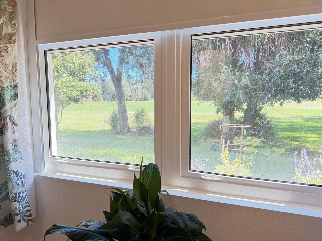 Photo 20 of 20: View of Golf Course From Primary Bedroom.