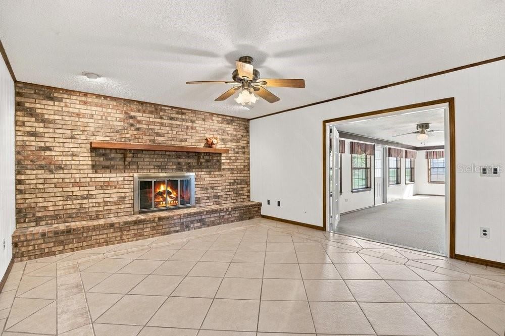 Photo 16 of 20: Family Room and Enclosed Patio