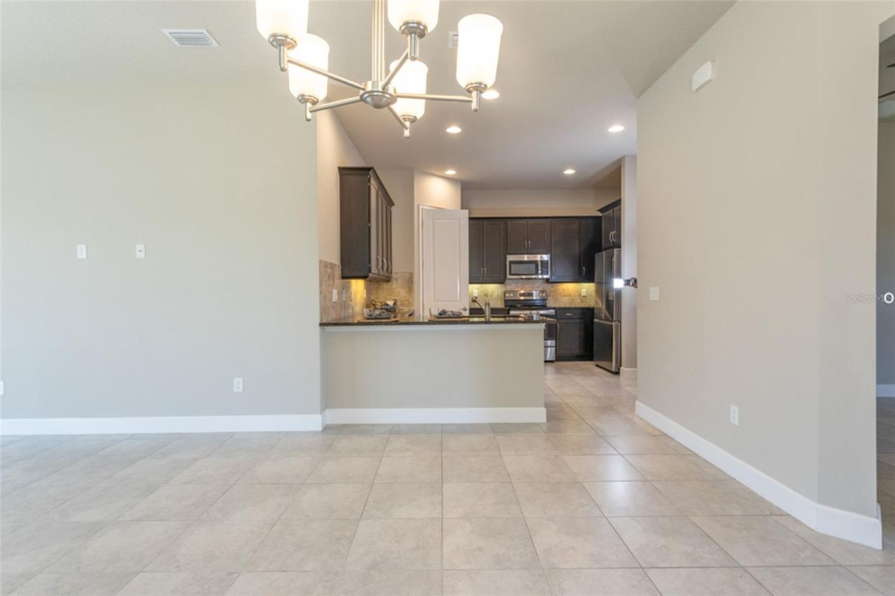 Photo 8 of 20: Open concept -- view from dining area into kitchen