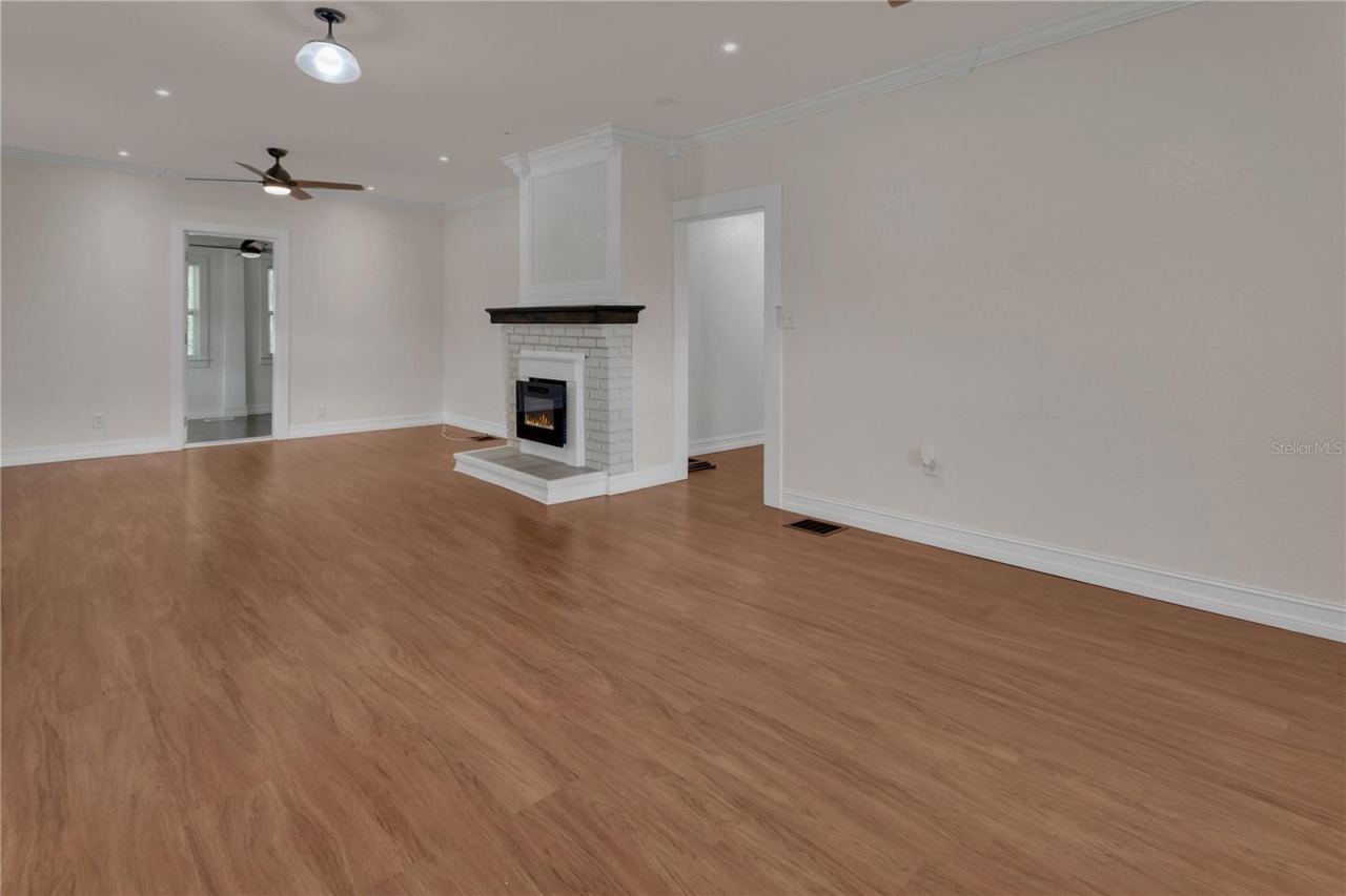 Photo 2 of 20: DOWNSTAIRS LIVING ROOM