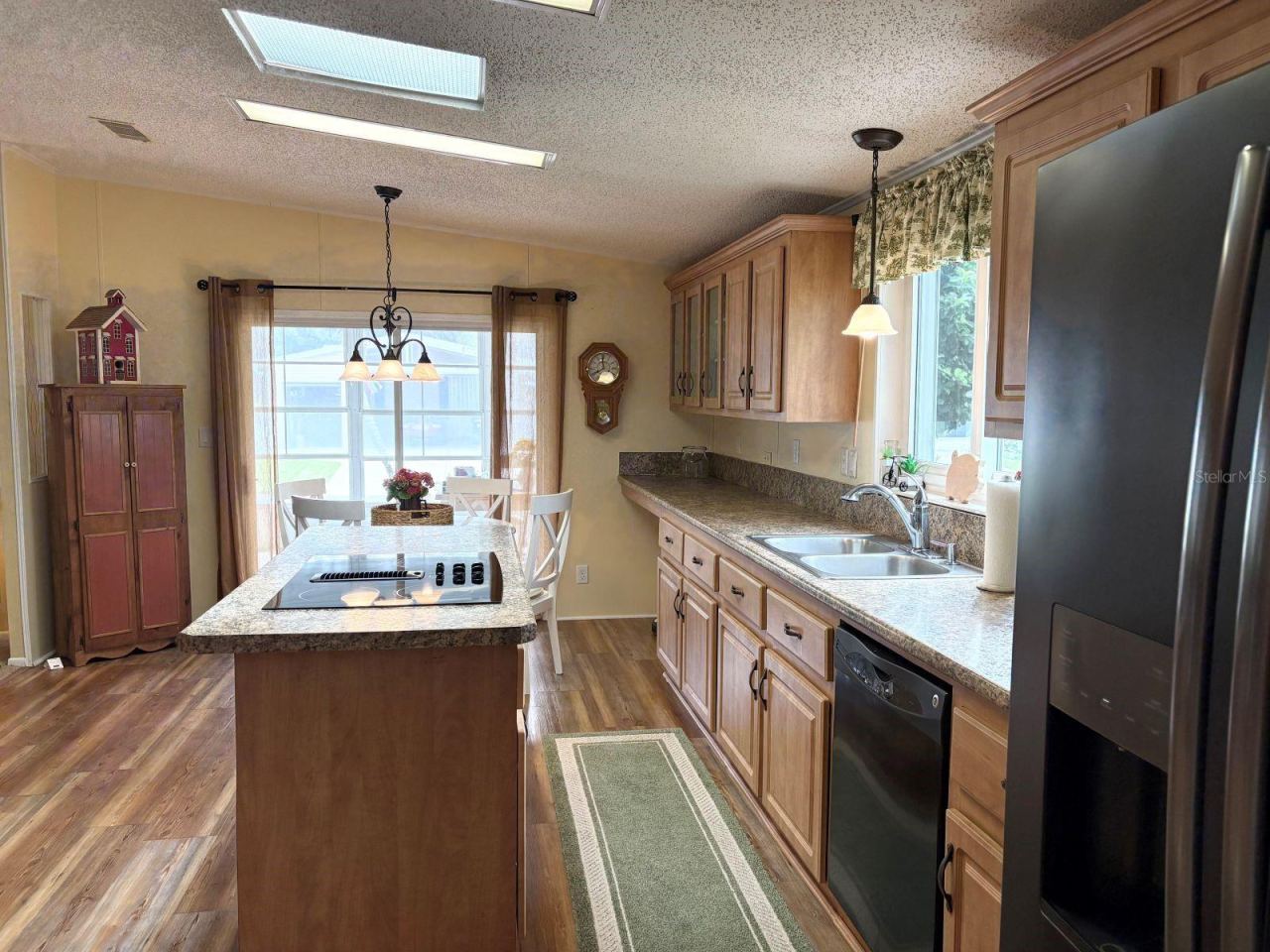 Photo 12 of 20: Kitchen with slider to enclosed porch