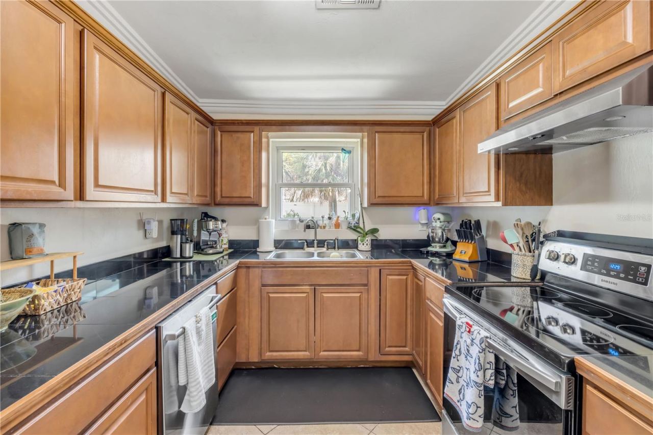 Photo 10 of 20: Kitchen view highlighting cabinet storage and counter space.