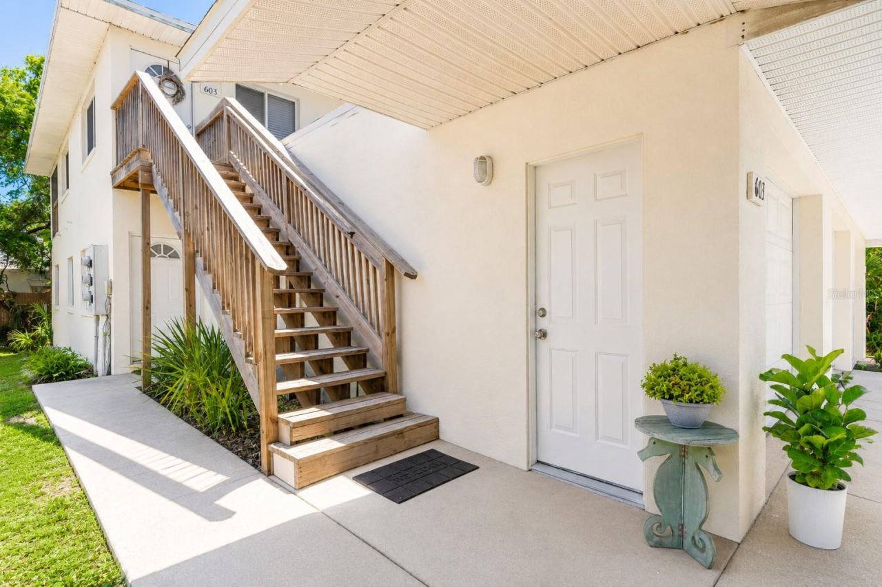 Photo 1 of 20: Rarely offered NSB Beachside Triplex