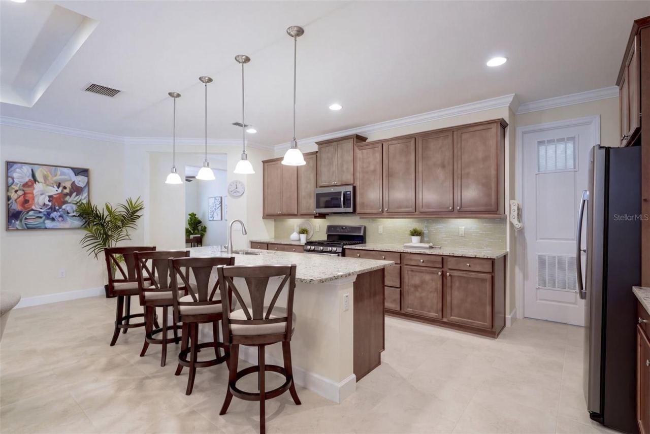 Photo 7 of 20: Spacious breakfast island & walk-in pantry for the Kitchen