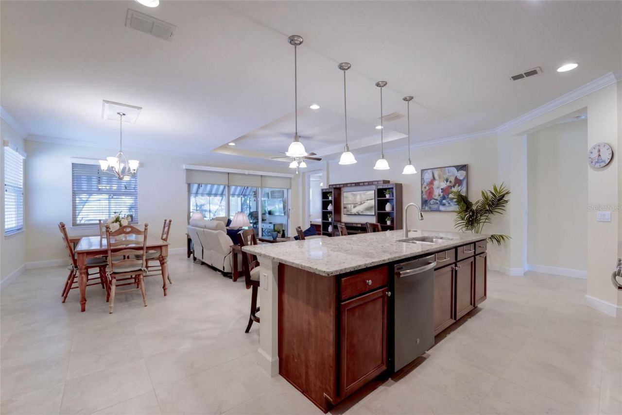 Photo 8 of 20: View of the Dining & Great Room areas from the Kitchen