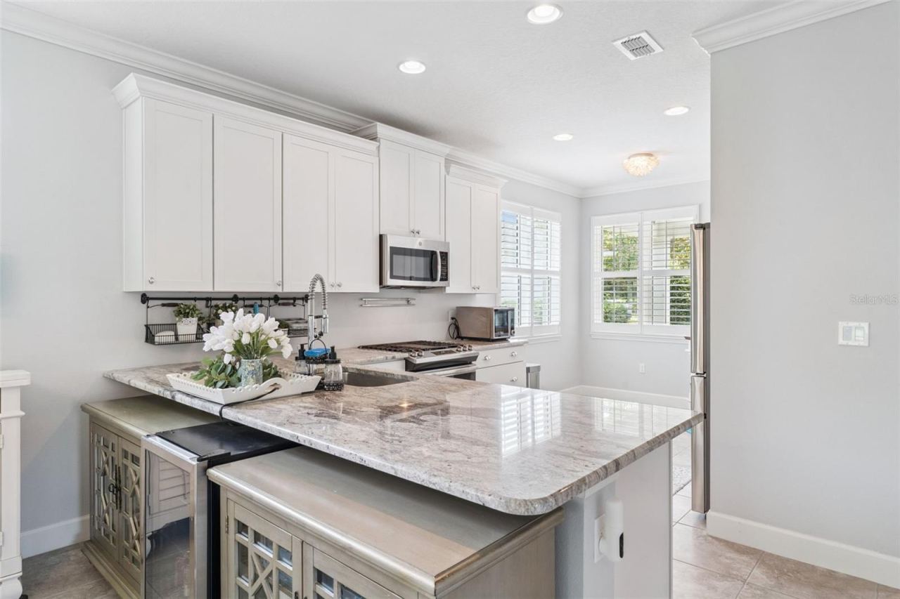 Photo 4 of 20: 9'6" x 11' Kitchen w/ 42" "soft close" cabinets, granite countertops & crown molding