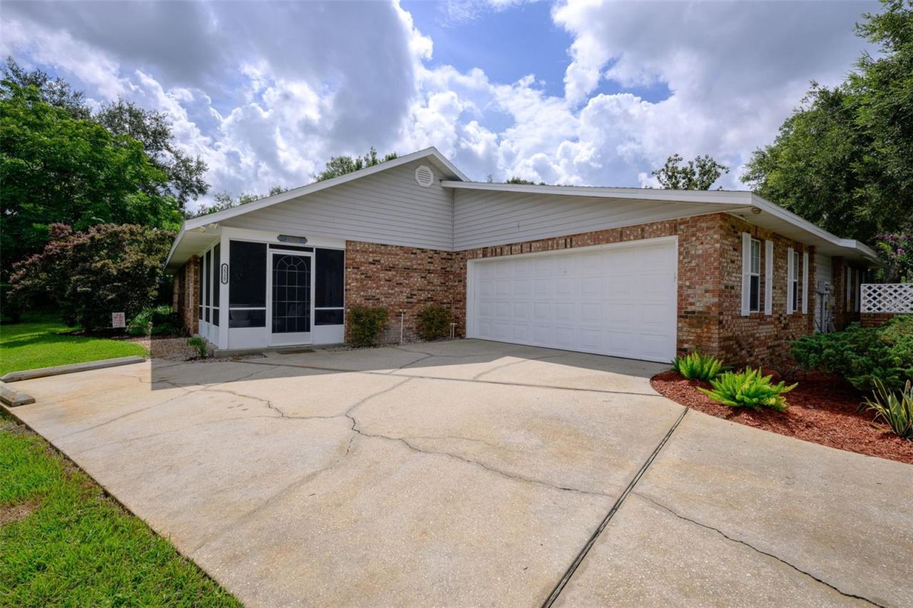 Photo 2 of 20: 2+ car garage with additional golf cart space
