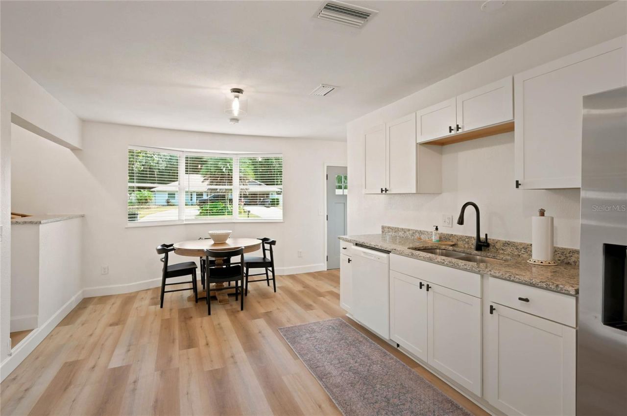 Photo 14 of 20: kitchen to dining and bay window to front