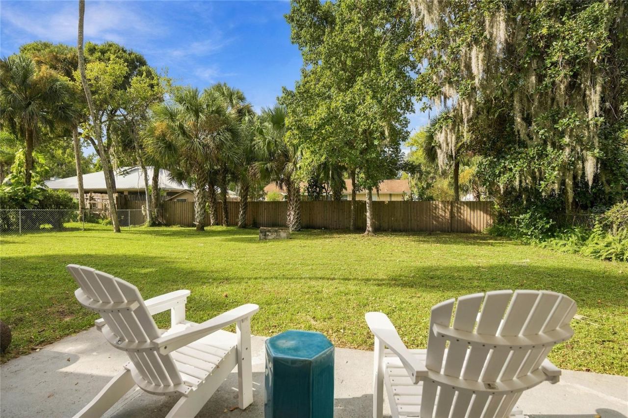 Photo 10 of 20: outside patio and huge fenced yard