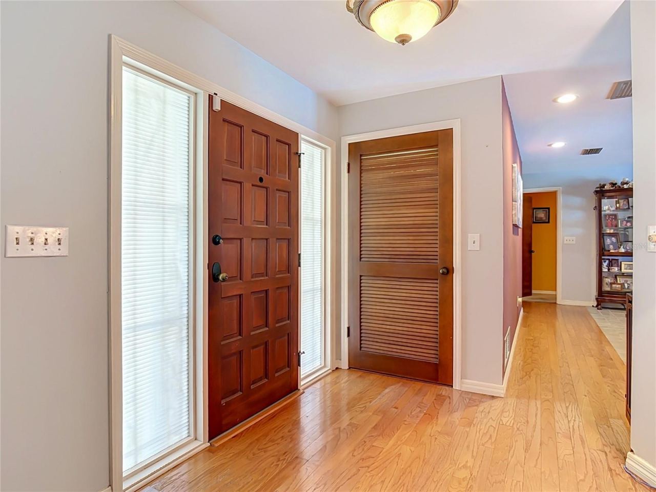 Photo 14 of 20: foyer entryway with two large storage closets