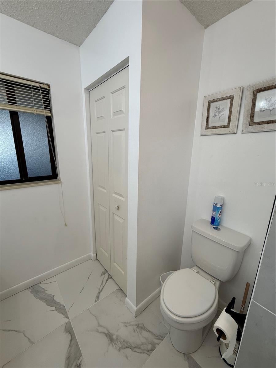 Photo 18 of 20: Guest Bath Linen & Toilet