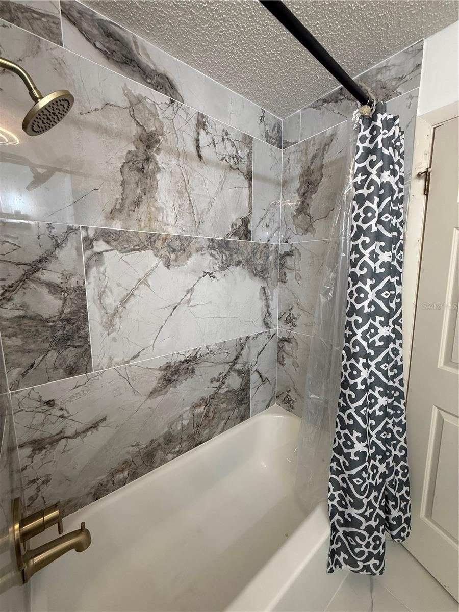 Photo 17 of 20: Guest Bath Tub & Shower
