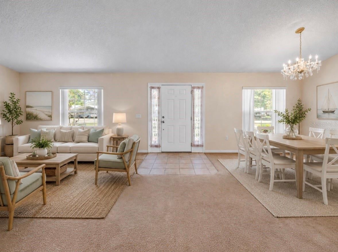 Photo 4 of 20: Virtually Staged entry living/dining rooms